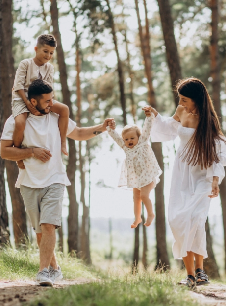 A family enjoying a vacation in the forest, surrounded by the beauty of nature and incredible destinations.